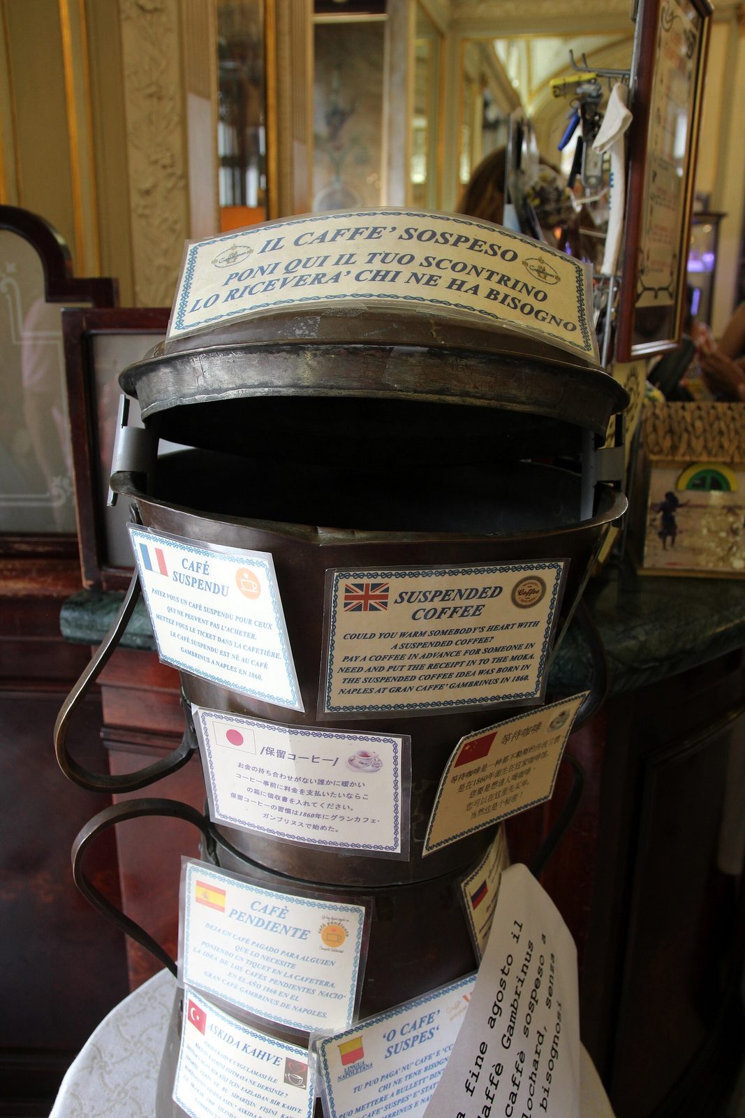 The caffè sospeso box on the counter at Gran Caffè Gambrinus in Naples, where customers prepay a coffee for a stranger