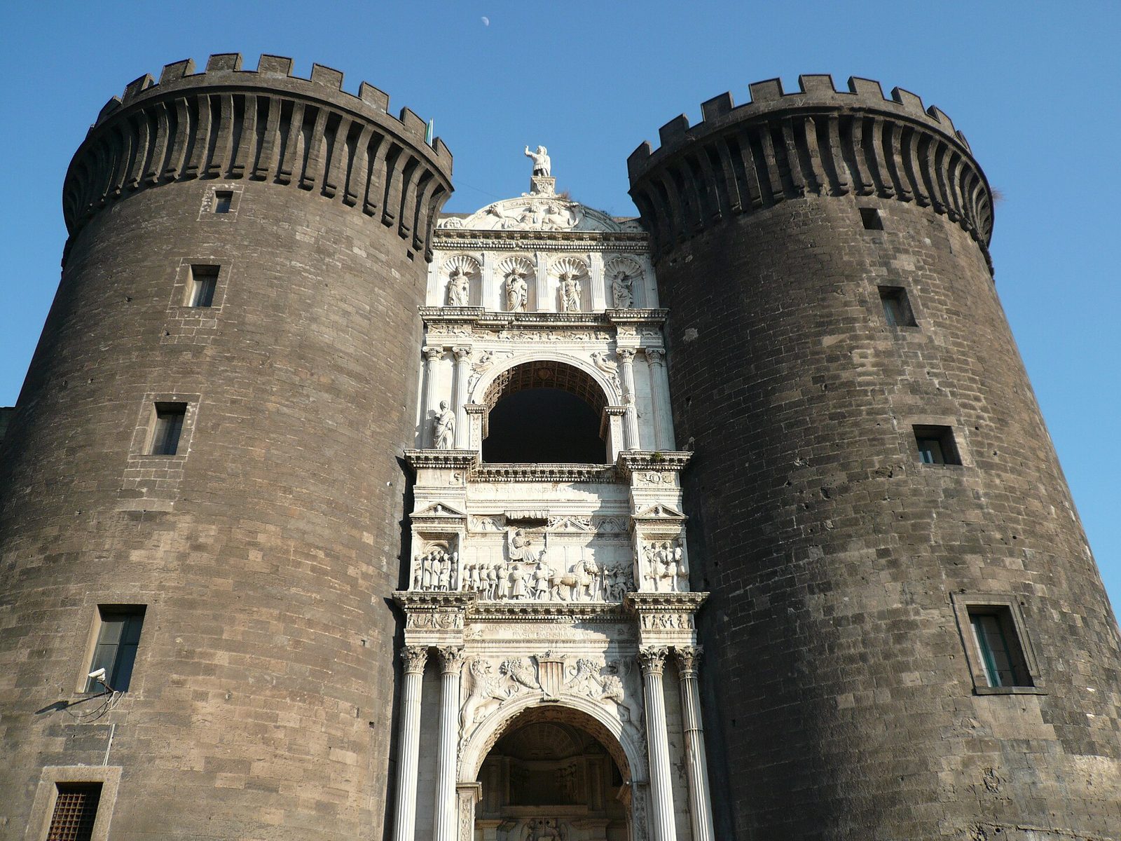 The white marble triumphal arch of Castel Nuovo in Naples, set between two massive round towers