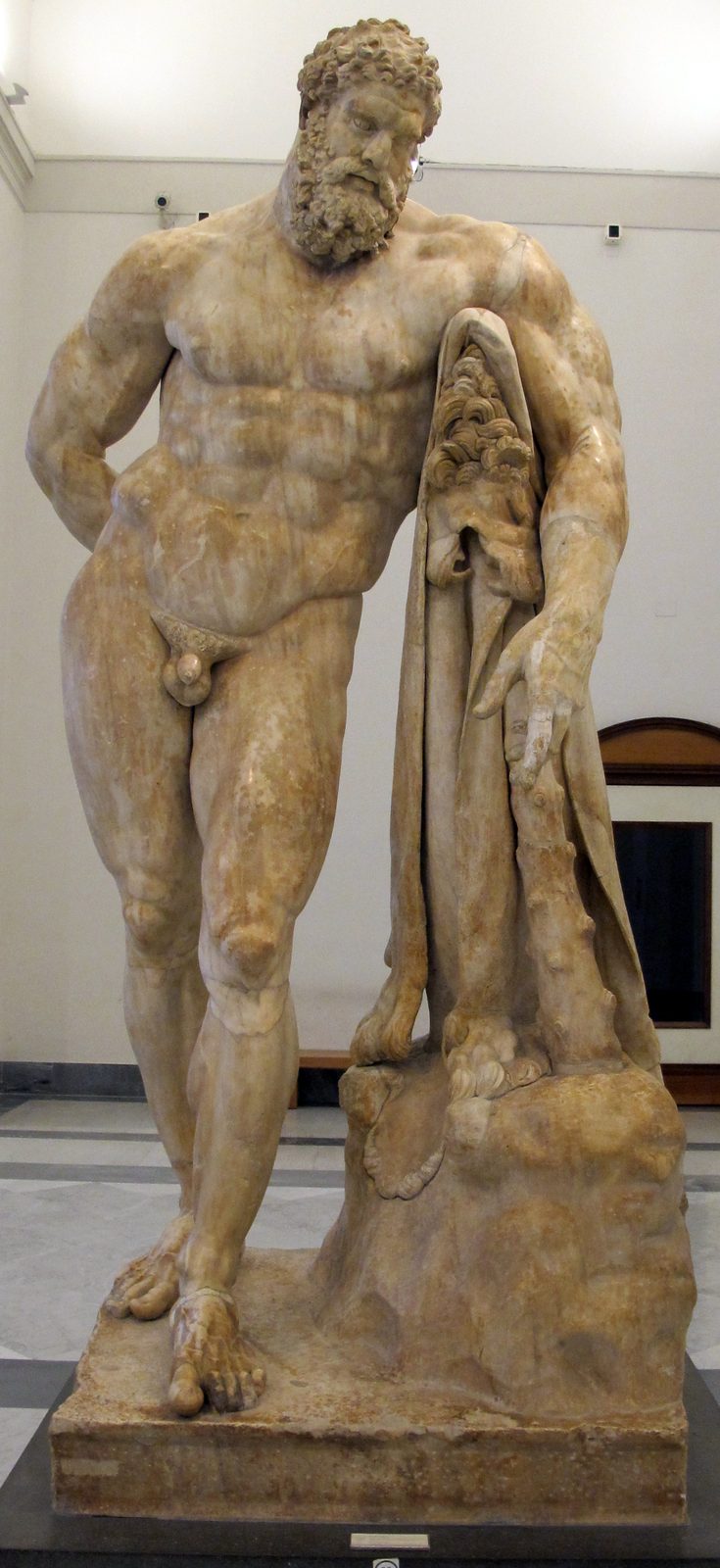 The Farnese Hercules, a colossal marble statue in the National Archaeological Museum of Naples