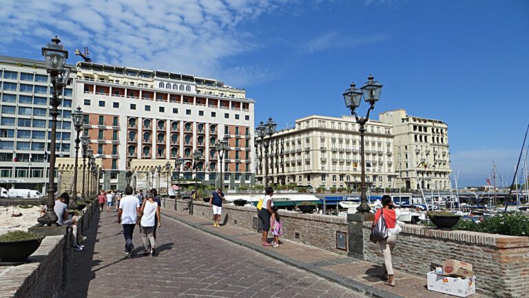 The Grand Hotel Vesuvio and neighboring seafront hotels on Via Partenope, seen from the Castel dell'Ovo causeway