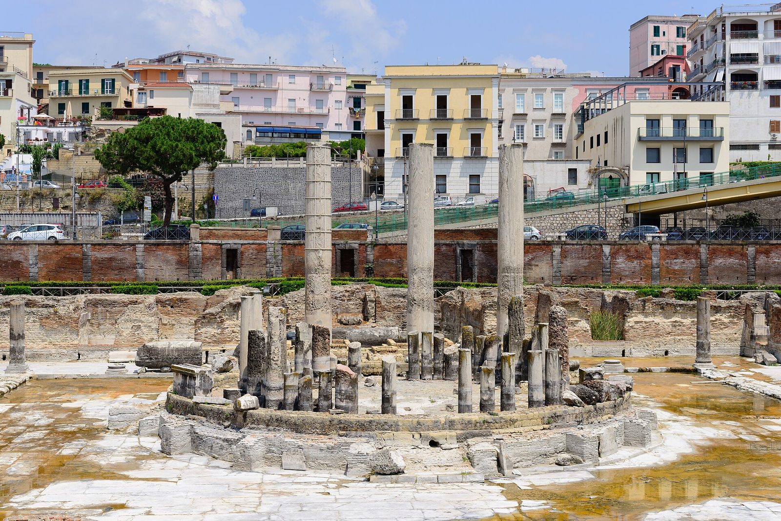 The Roman Macellum of Pozzuoli with its three tall columns, the classic monument of the Campi Flegrei's rising and sinking ground