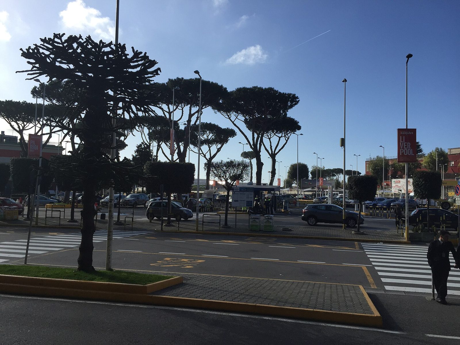 The forecourt outside Naples airport arrivals, where the Alibus stop and the taxi rank are located