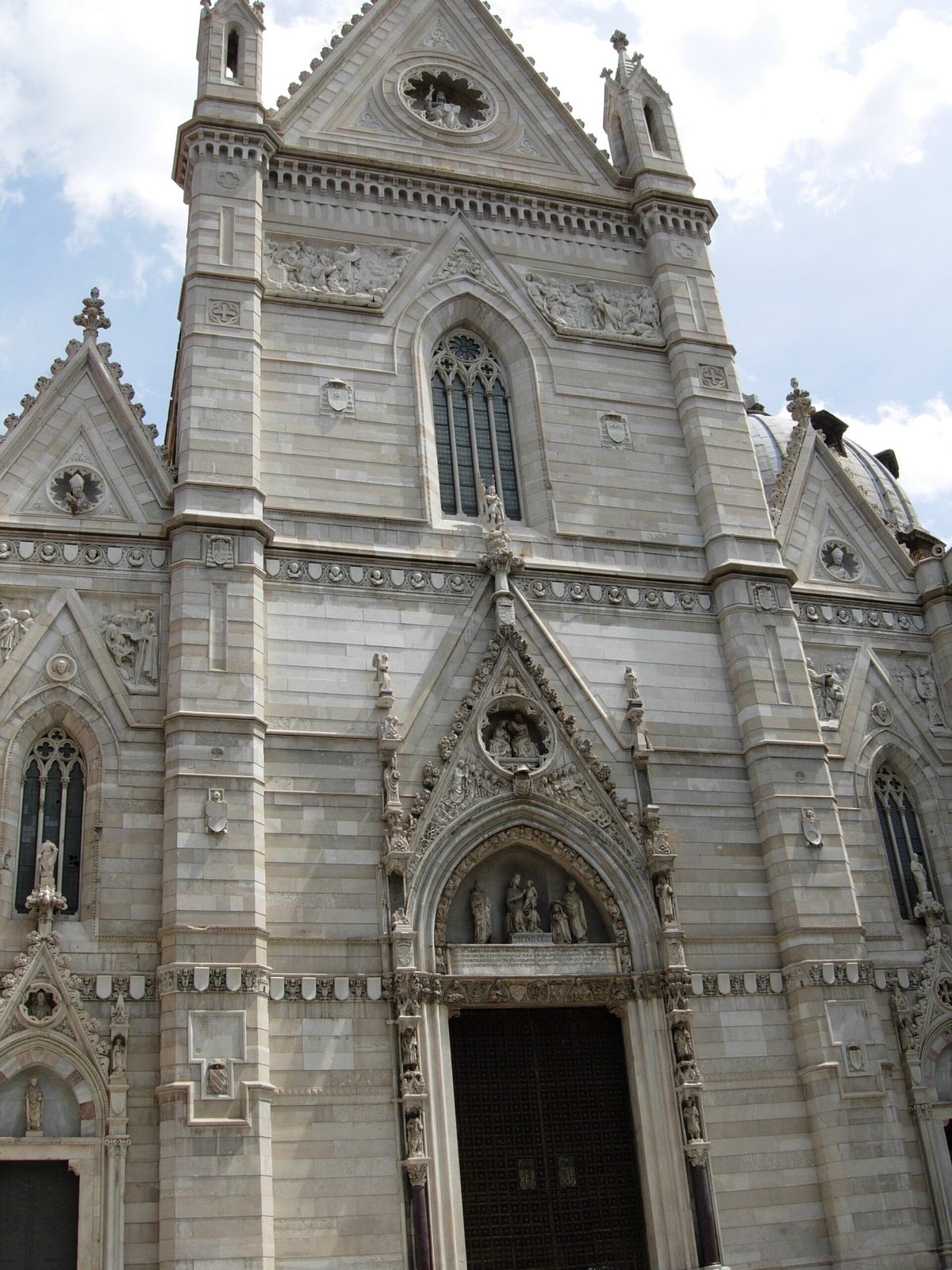 The Gothic Revival facade of the Duomo, Naples Cathedral, on Via Duomo