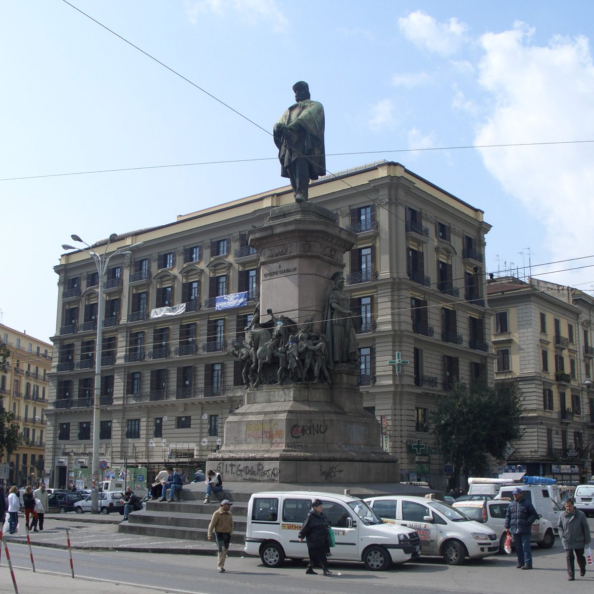Taxis and traffic around the Garibaldi monument in Piazza Garibaldi, outside Napoli Centrale