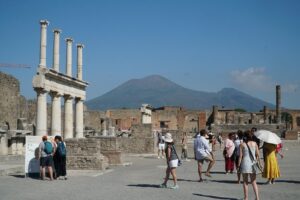 The Forum of Pompeii with Mount Vesuvius rising behind the ruined columns