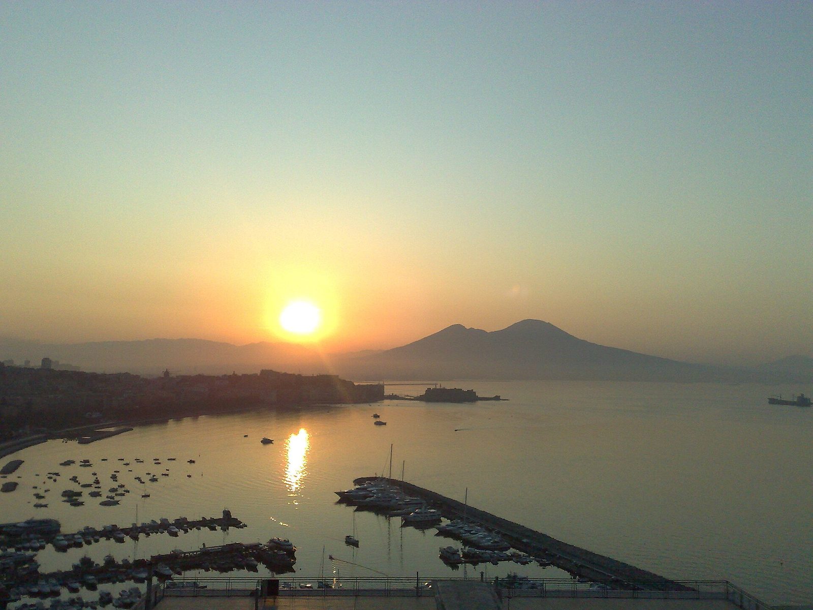 Sunrise over the bay of Naples and Mount Vesuvius seen from Posillipo
