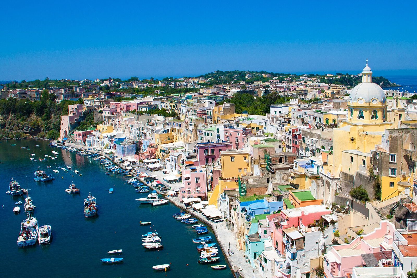 The colorful houses and fishing boats of Marina Corricella on Procida, a short crossing from Naples and Ischia