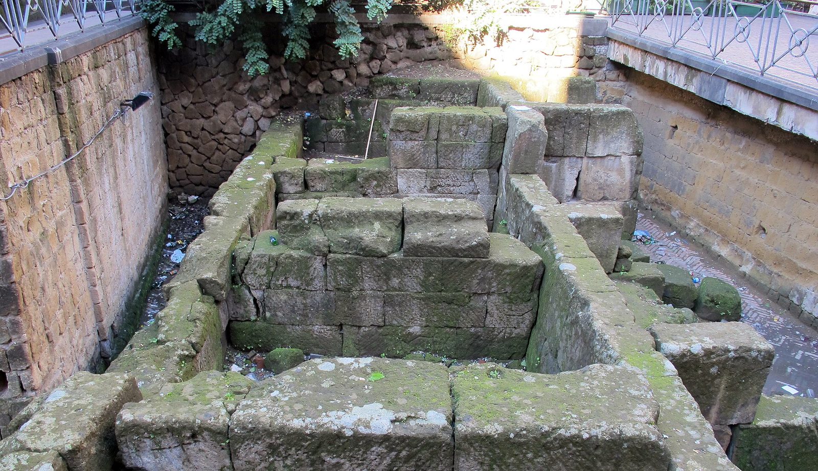 Greek wall blocks excavated in Piazza Bellini, a visible piece of Naples, Italy history