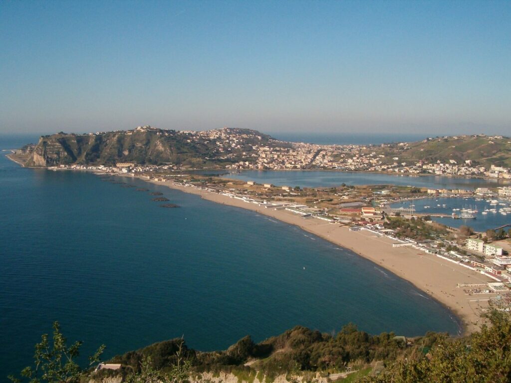 The long sandy curve of Miliscola beach and Capo Miseno seen from Monte di Procida, west of Naples