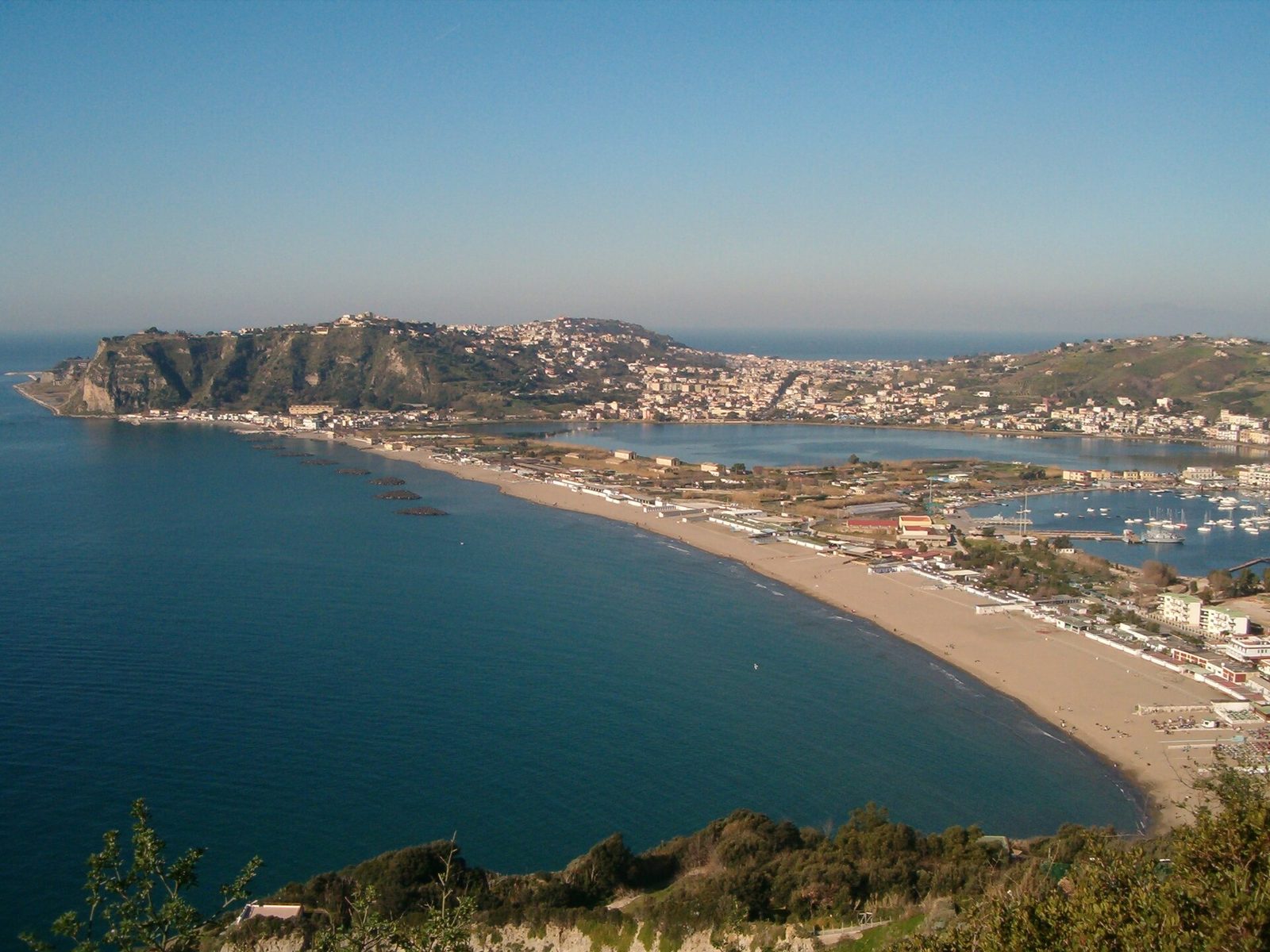 The long sandy curve of Miliscola beach and Capo Miseno seen from Monte di Procida, west of Naples