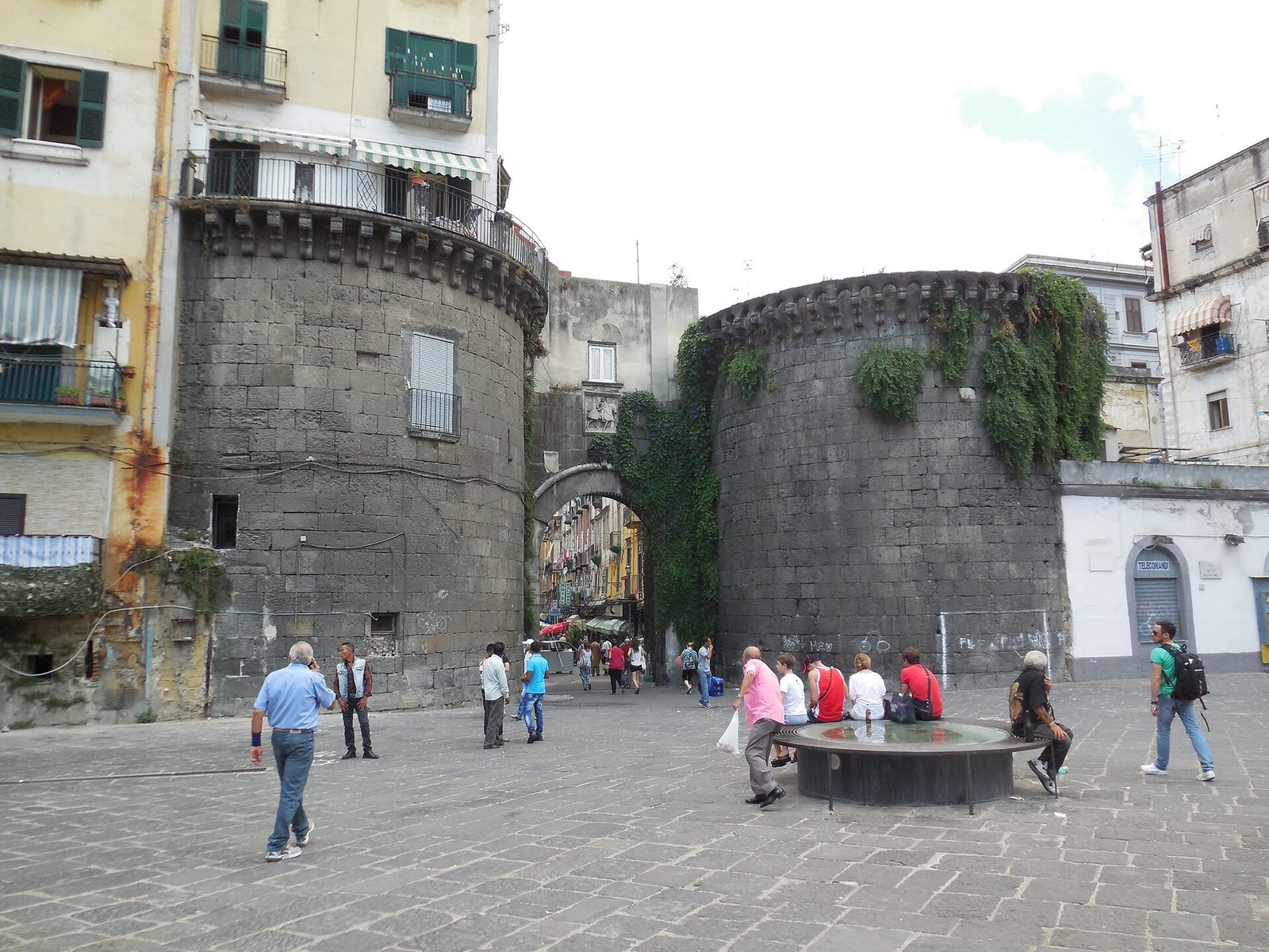 The twin round towers of Porta Nolana, the old city gate beside the Naples fish market