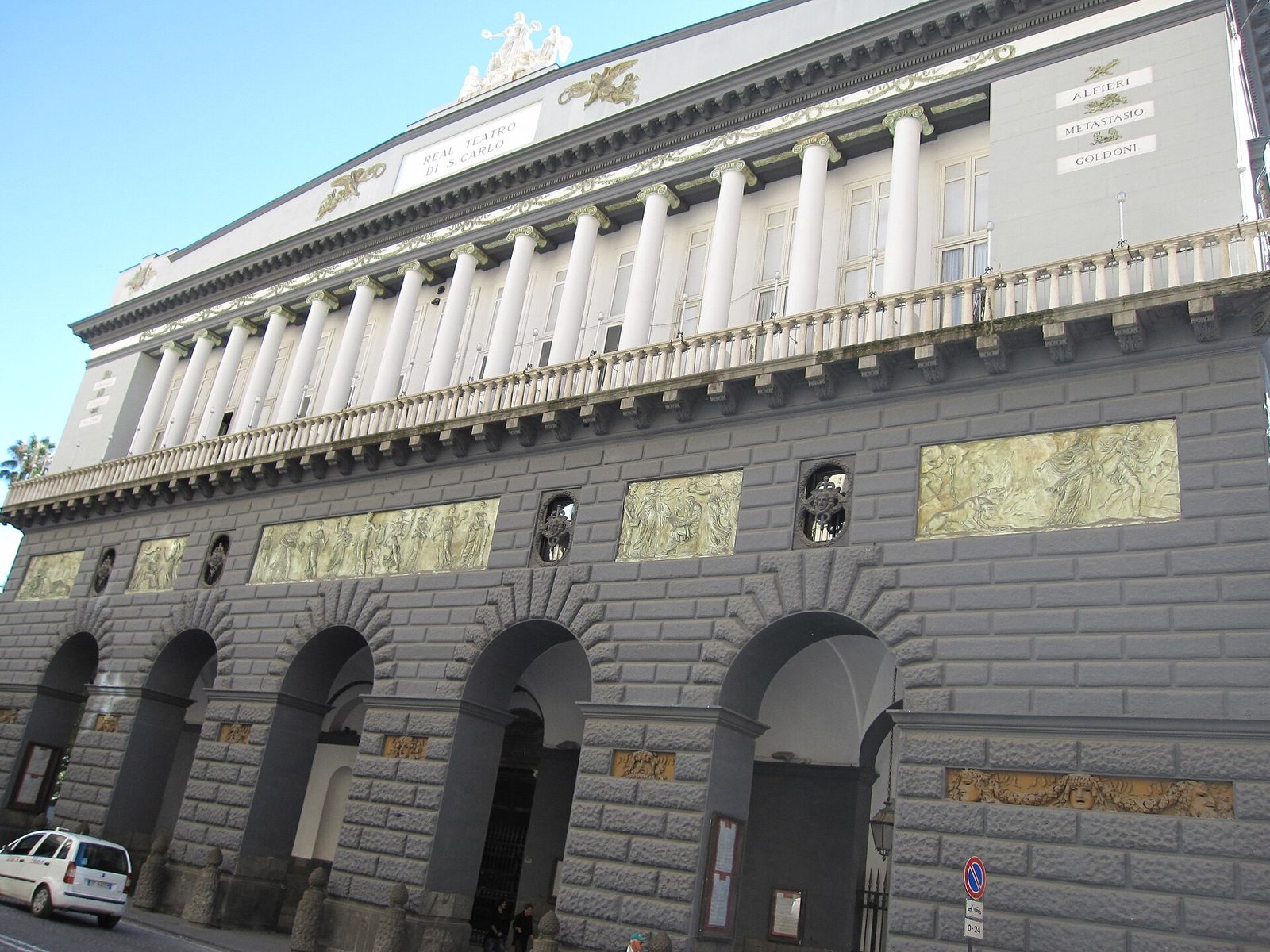 The arcaded facade of the Teatro di San Carlo opera house in Naples