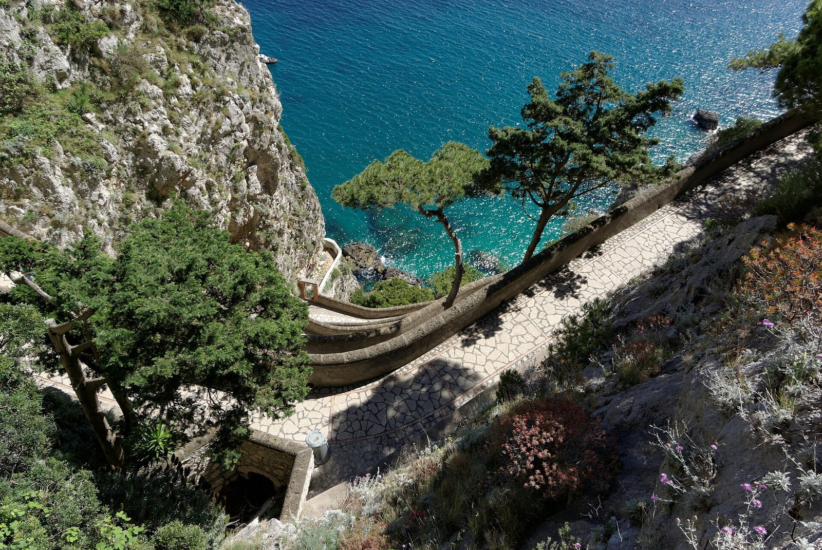 The zigzag switchbacks of Via Krupp on Capri descending toward the sea